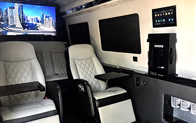 Interior images of a luxury Mercedes Sprinter Executive Limousine for Go Luxe executive transportation and executive limo services