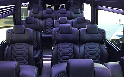 Interior of the 13 passenger Mercedes Sprinter Limo Van with individual leather seating, premium audio for luxury transportation in Los Angeles and Southern California