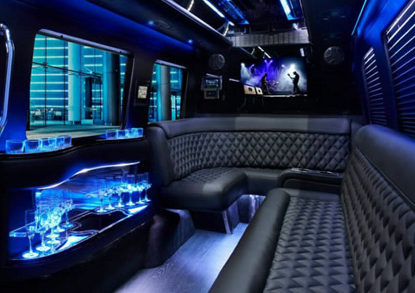 Interior of the totally tricked out, Go Luxe Mercedes Social Sprinter Luxury Limousine with TVs and wet bar for a party on wheels and amazing night on the town