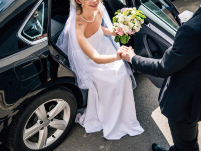 cropped-view-of-bridegroom-in-suit-giving-hand-to-2024-11-14-15-46-26-utc (1)