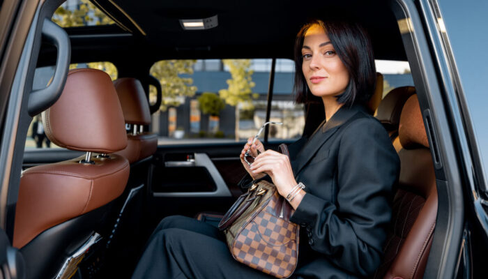 portrait-of-an-elegant-business-lady-in-car-2025-03-15-06-51-18-utc