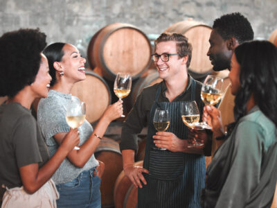 group-of-friends-wine-tasting-at-a-distillery-or-c-2025-04-06-09-58-00-utc