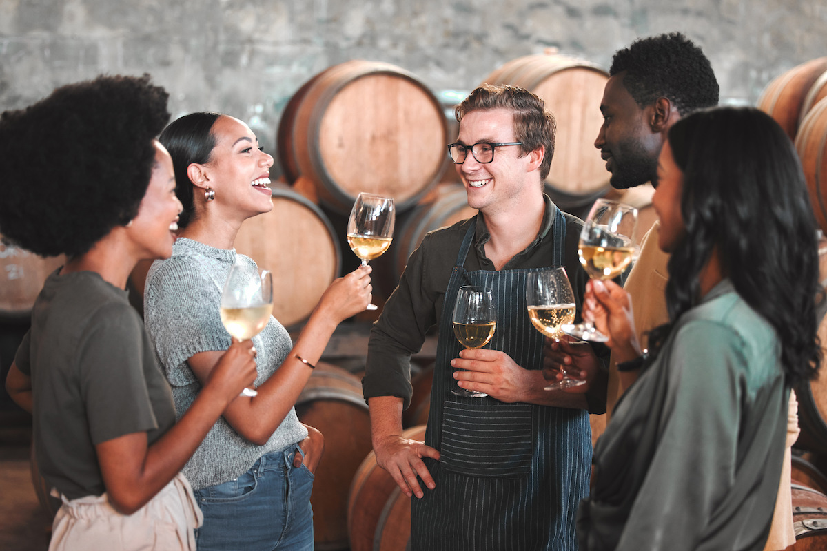 group-of-friends-wine-tasting-at-a-distillery-or-c-2025-04-06-09-58-00-utc