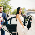portrait-of-newlywed-couple-sit-in-car-after-cerem-2025-03-08-18-30-20-utc