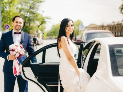 portrait-of-newlywed-couple-sit-in-car-after-cerem-2025-03-08-18-30-20-utc