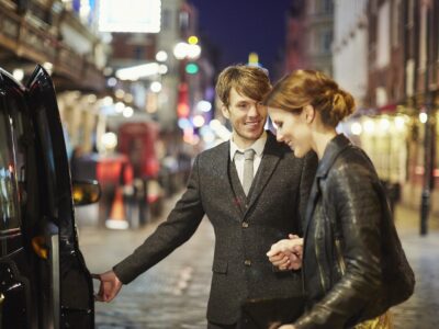 A couple enjoys a night out in the city