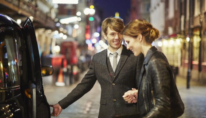 A couple enjoys a night out in the city